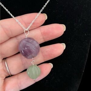 Large round Carved amethyst pendant set in silver plus matching necklace